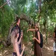 Tourist interacting with a ring-tailed lemur at Lemuria Land Park in Madagascar