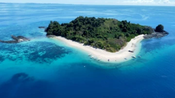 Snorkeling at Nosy Tanikely Marine Park near Nosy Be Madagascar with coral reefs and marine life